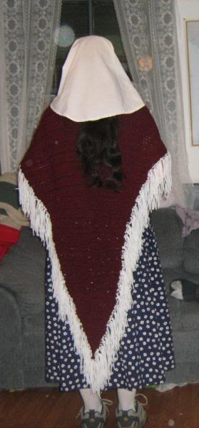 A view of the back when I'm wearing the maroon triangle shawl with a white fringe.