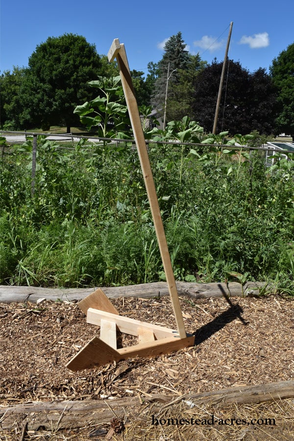 Completed homemade potato hiller sitting in the garden.
