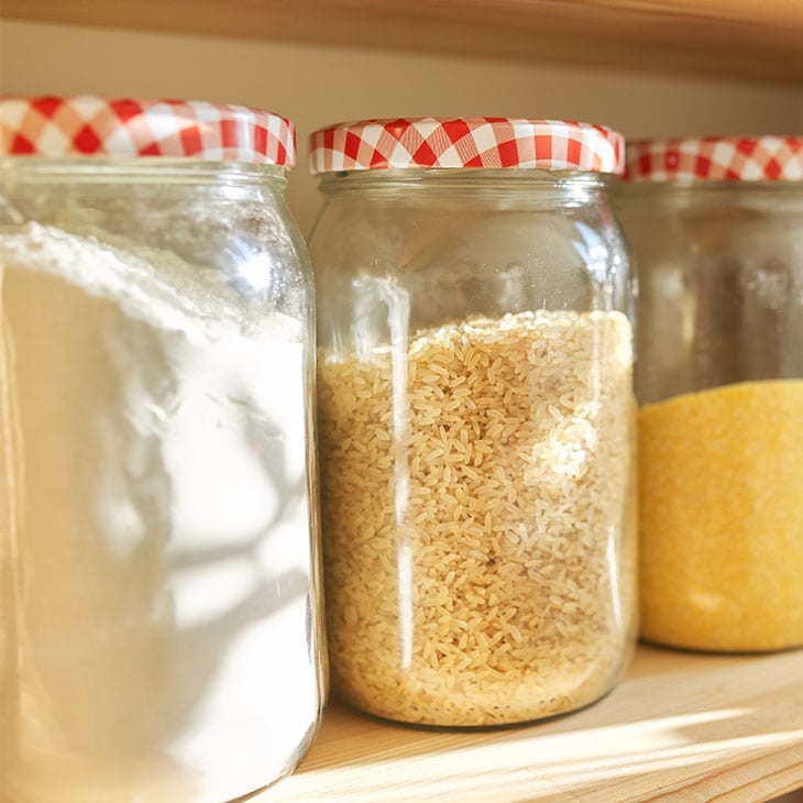 Glass jars filled with flour and rice