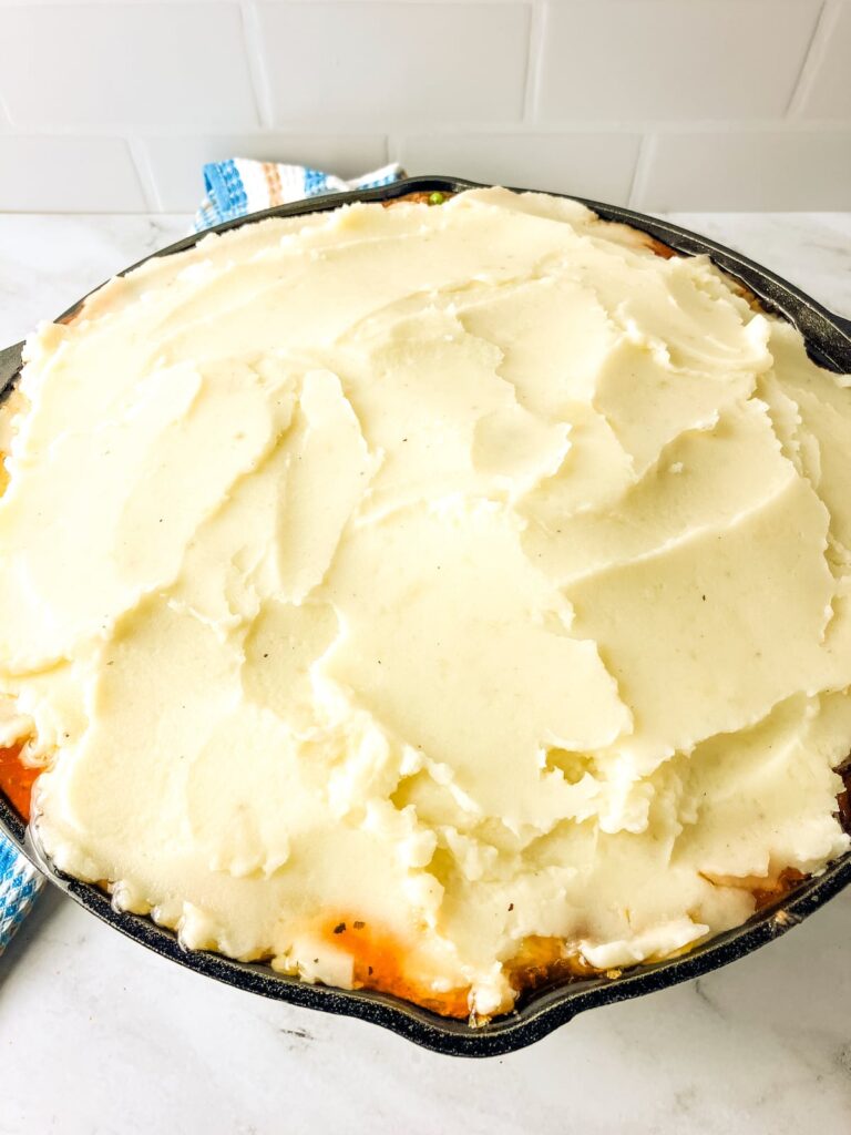 Skillet Shepherd's pie with homemade mashed potatoes on top.