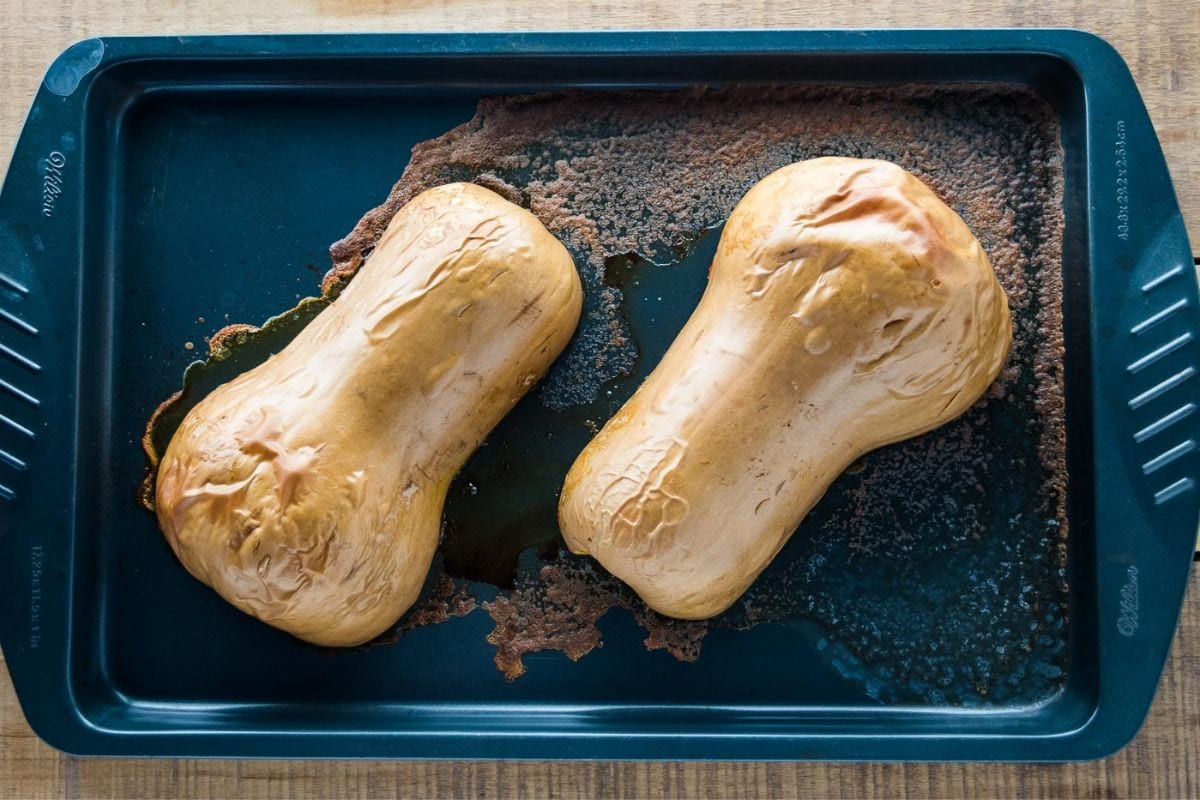 Roasted butternut squash on a baking tray.