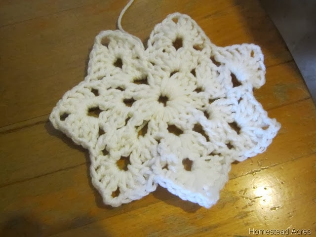 A white crochet snowflake.