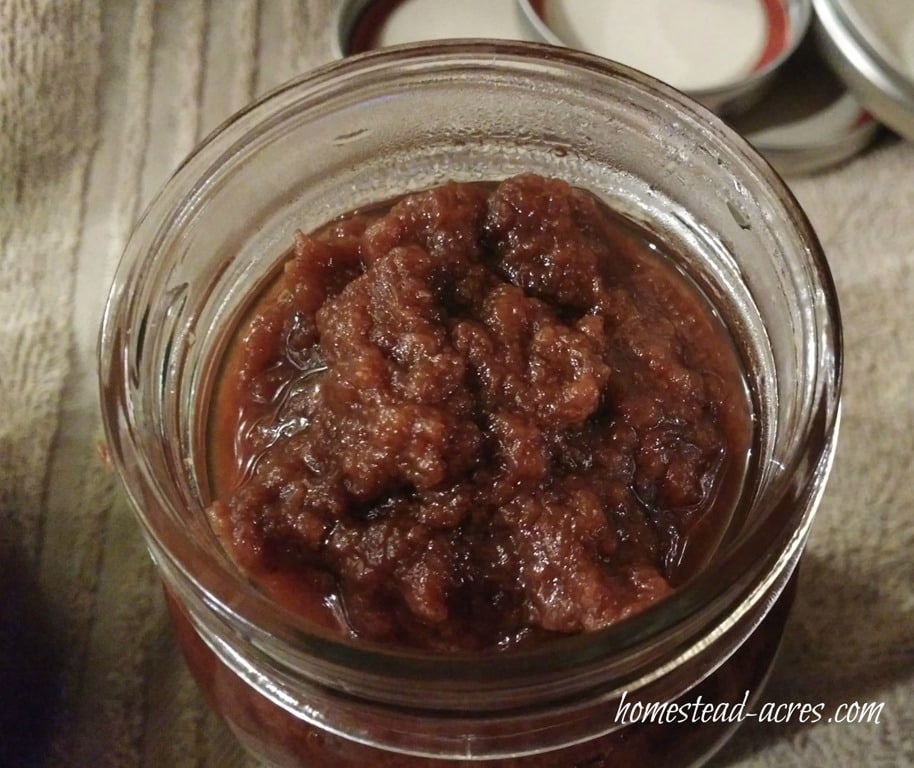 Homemade pear butter in a mason jar.