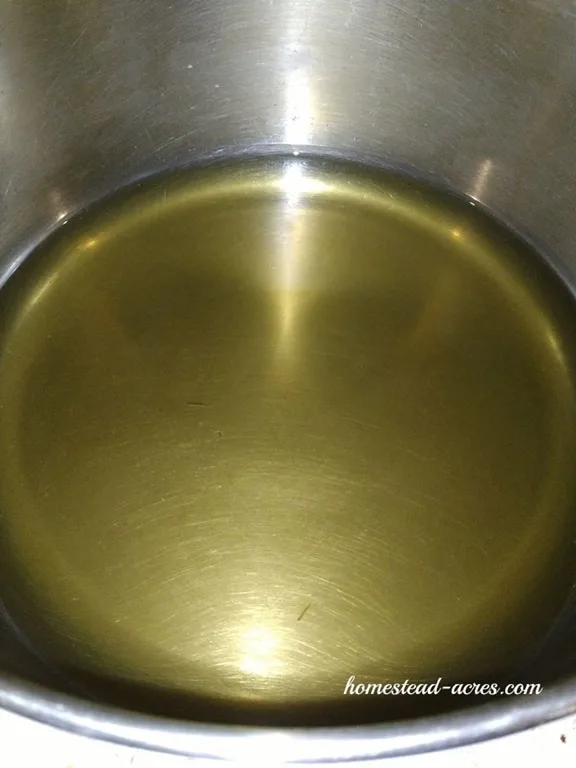 Dandelion tea in a pot.