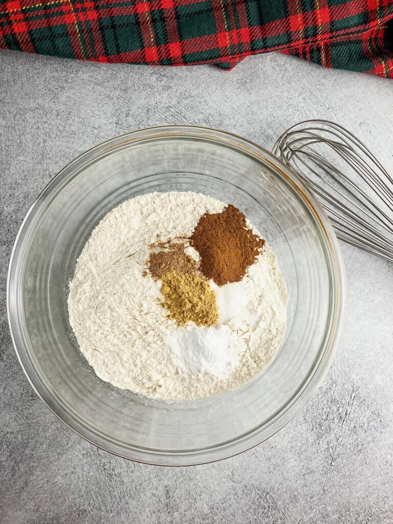 Mixing bowl with flour, salt, baking soda, and spices.