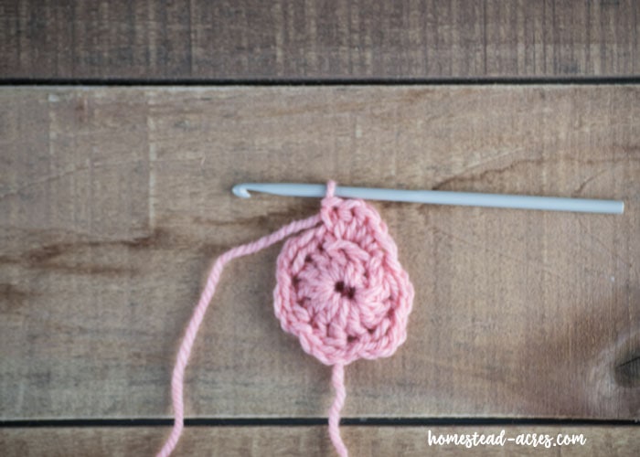 Making crochet flower petals.