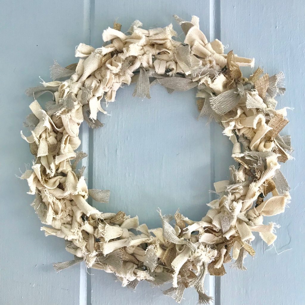 Cream colored rag wreath.