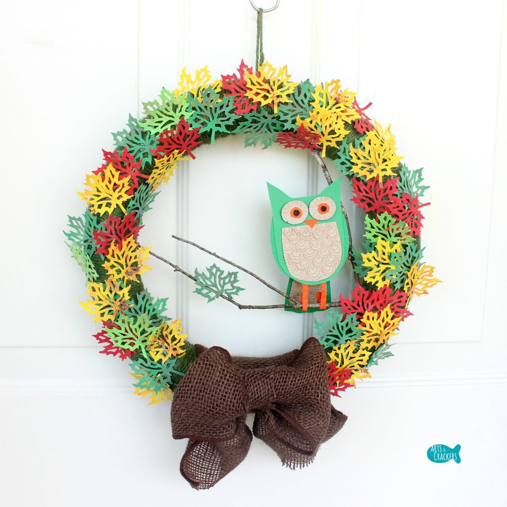 Paper leaf wreath with an owl.