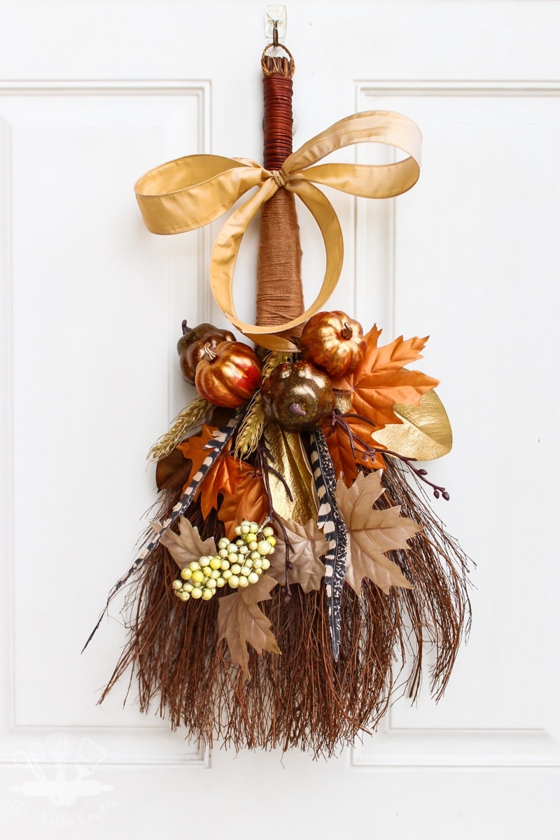 Rustic fall cinnamon broom wreath.