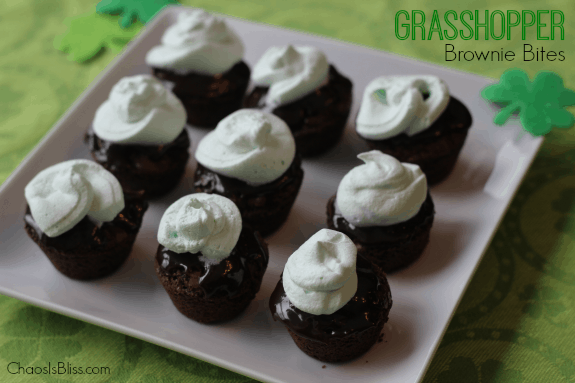 Grasshopper brownie bites on a white serving tray.