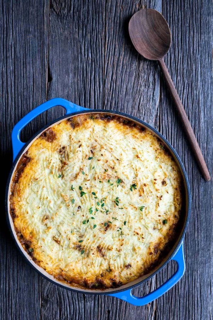 Shepherds pie in a blue cast iron pan.