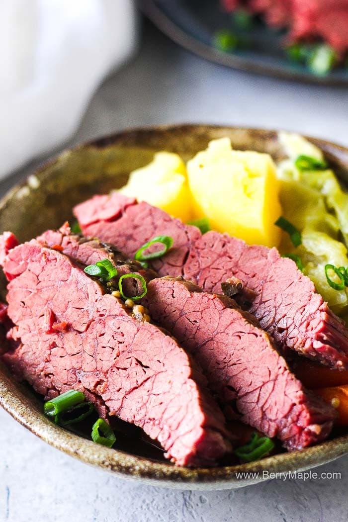 Slices of corned beef and cabbage in a bowl.