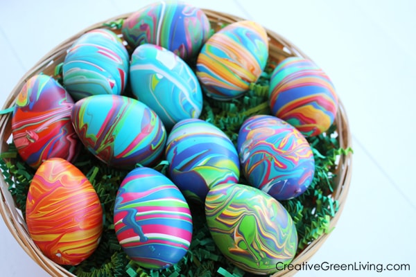 A basket filled with marbled Easter eggs.