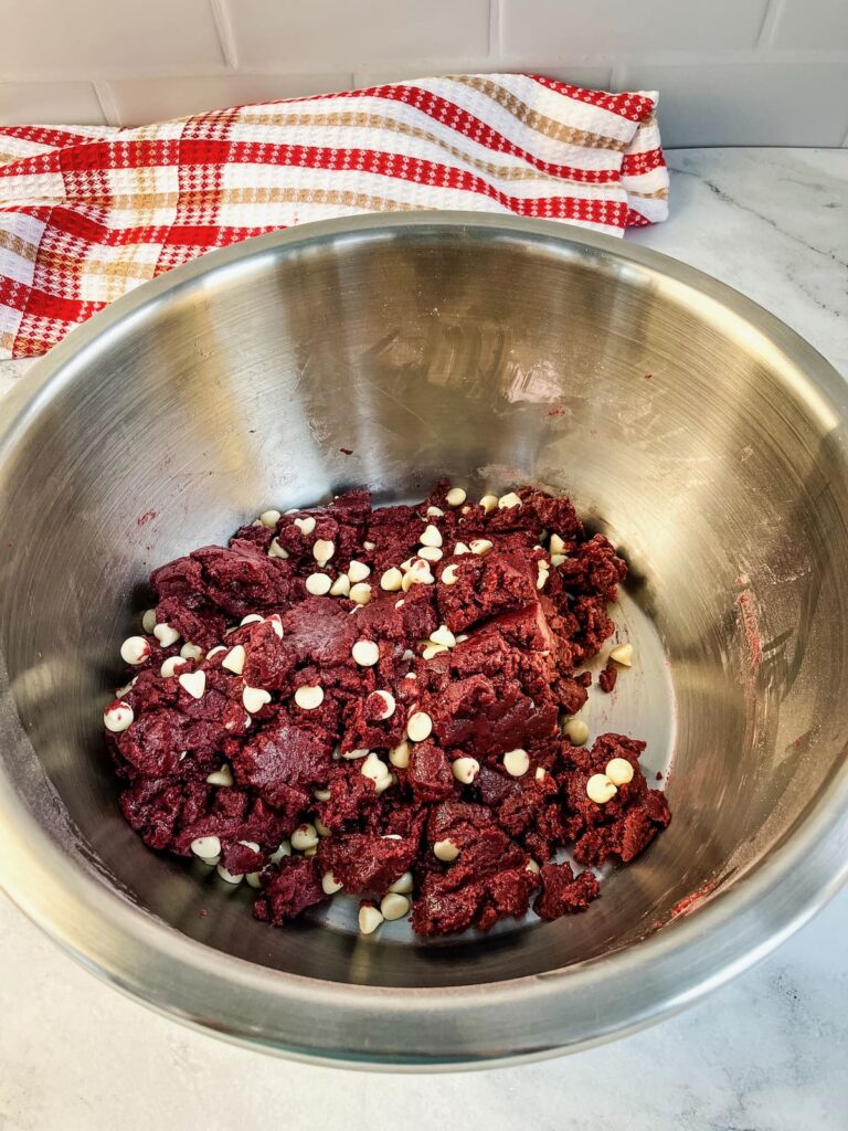 Red velvet cookie dough with white chocolate chips.