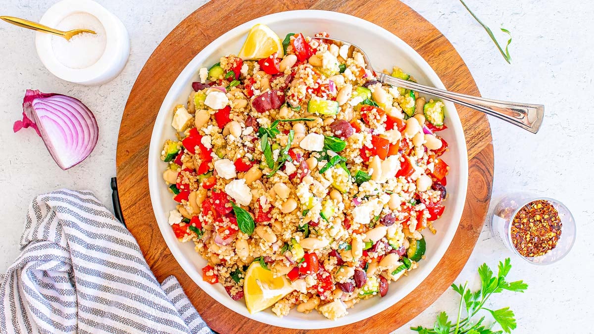 Mediterranean quinoa salad in a large serving bowl.