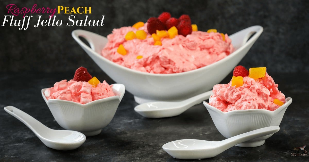 White ice cream bowls filled with homemade raspberry peach fluff.