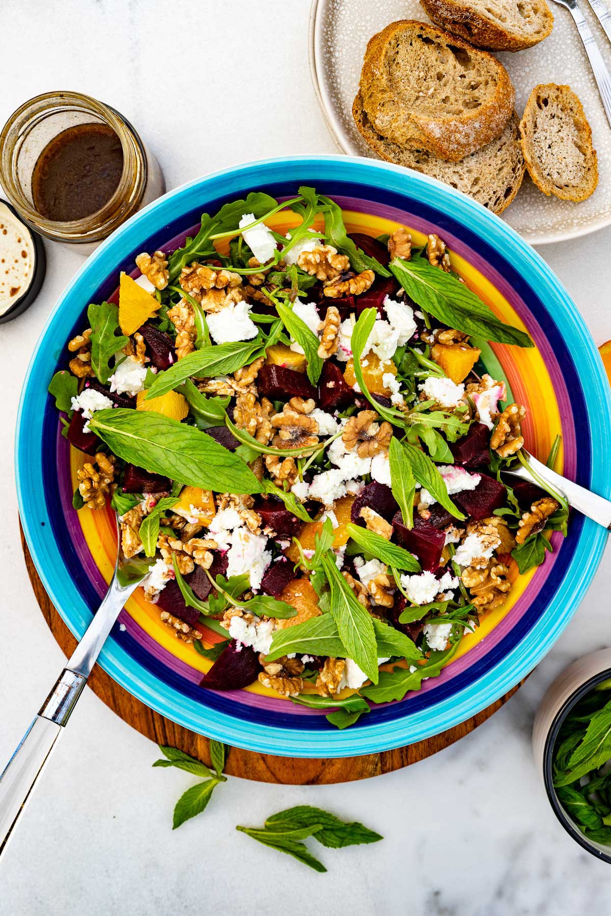 Beet and feta salad in a blue serving bowl.