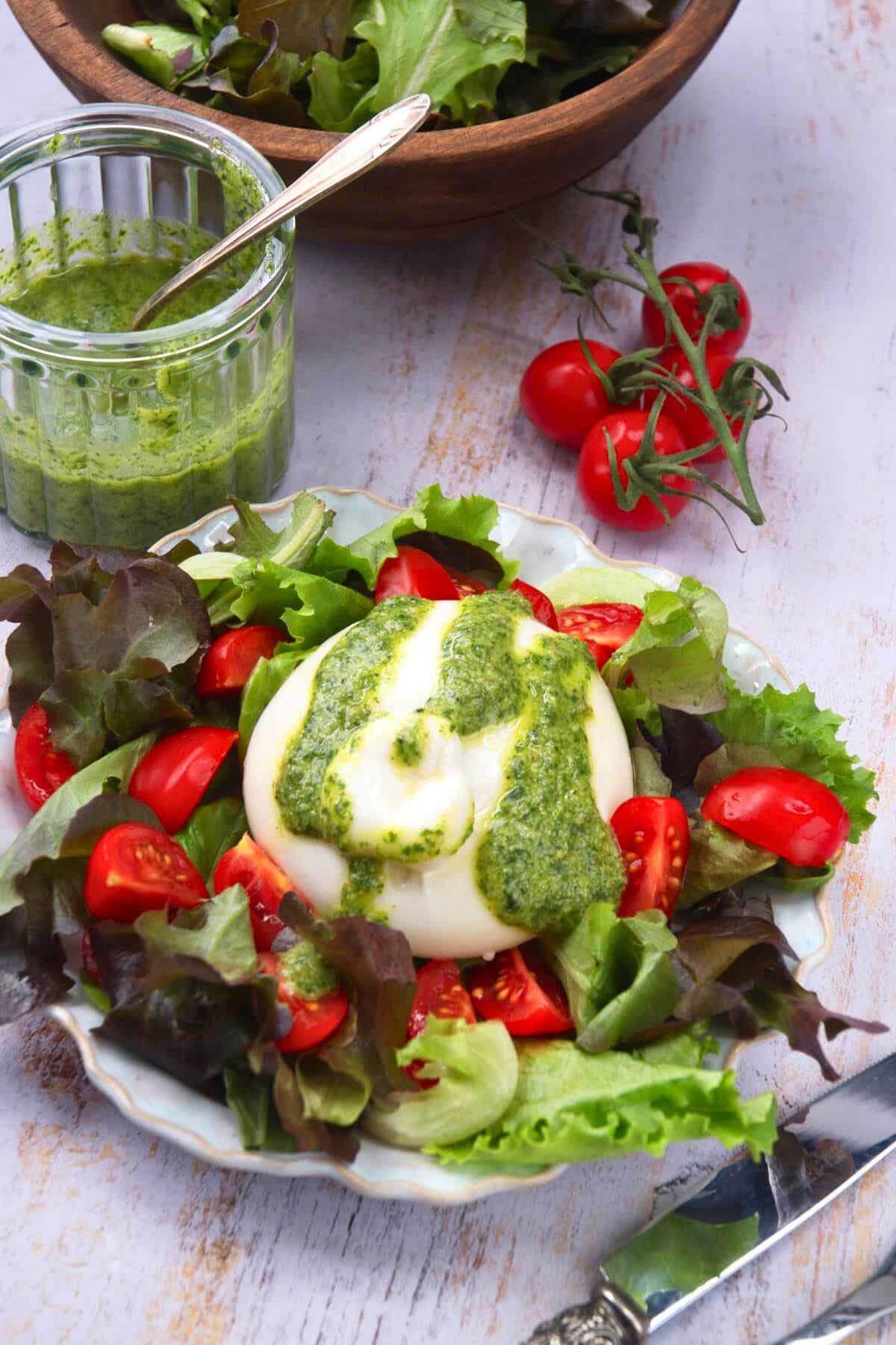Burrata salad on a plate.