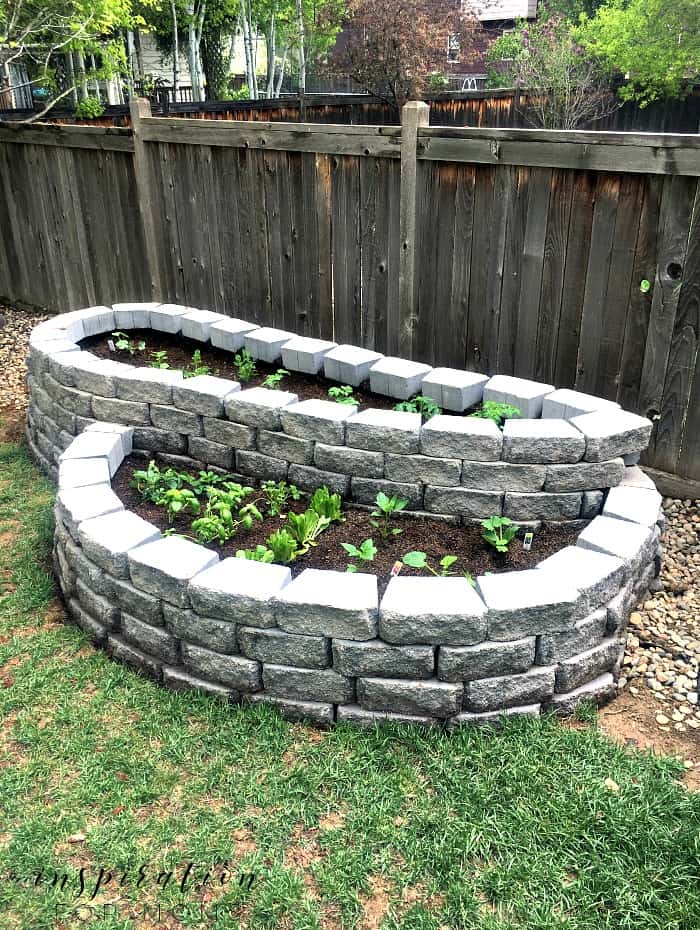 Two tiered raised bed garden made with pavers.
