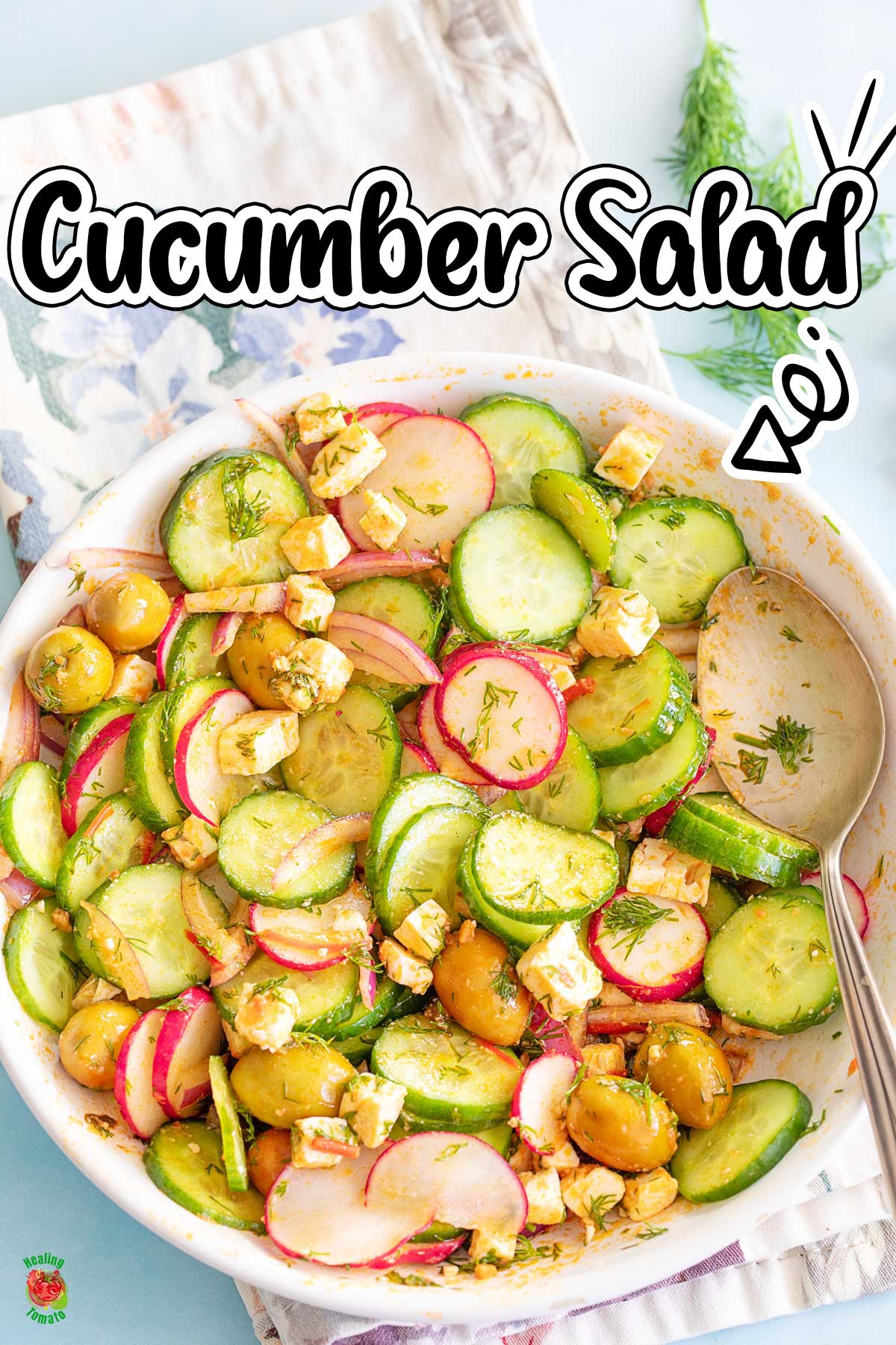 Spicy cucumber salad in a white serving dish. Text overlay says Cucumber Salad.