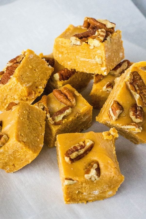 Dulce de Leche caramel fudge with pecans cut into pieces.