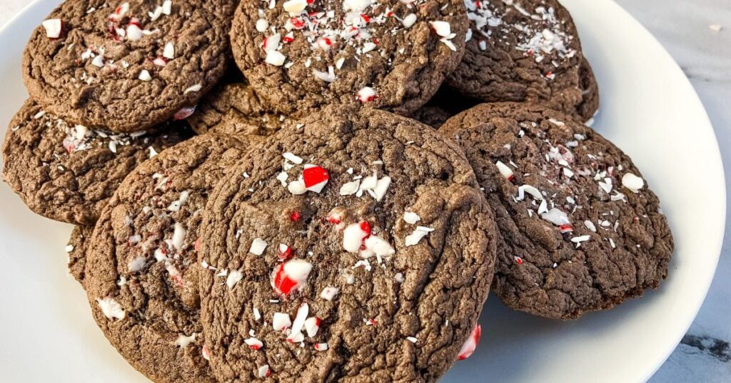 White plate of chocolate peppermint cake mix cookies.