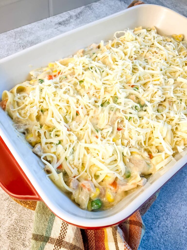 Shredded mozzarella cheese on top of the casserole.