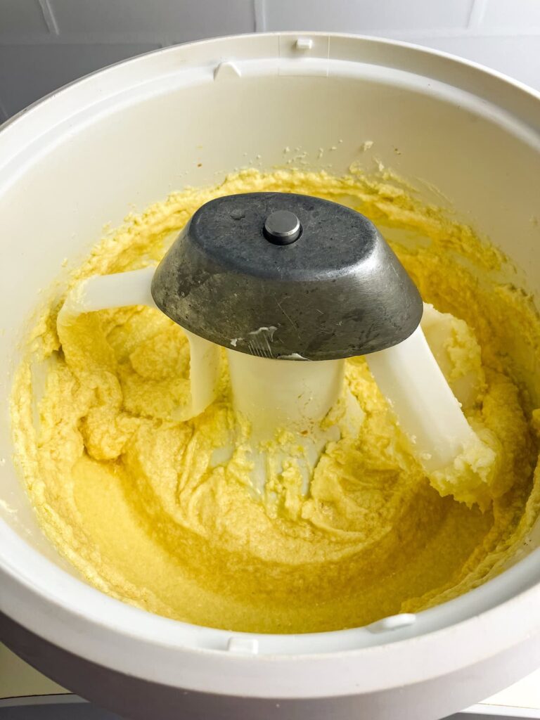 Wet ingredients mixed together in a stand mixer.