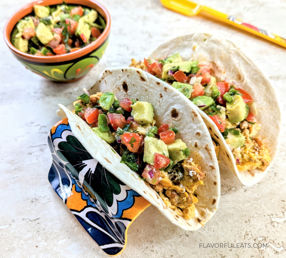 Chorizo breakfast tacos on a serving tray.