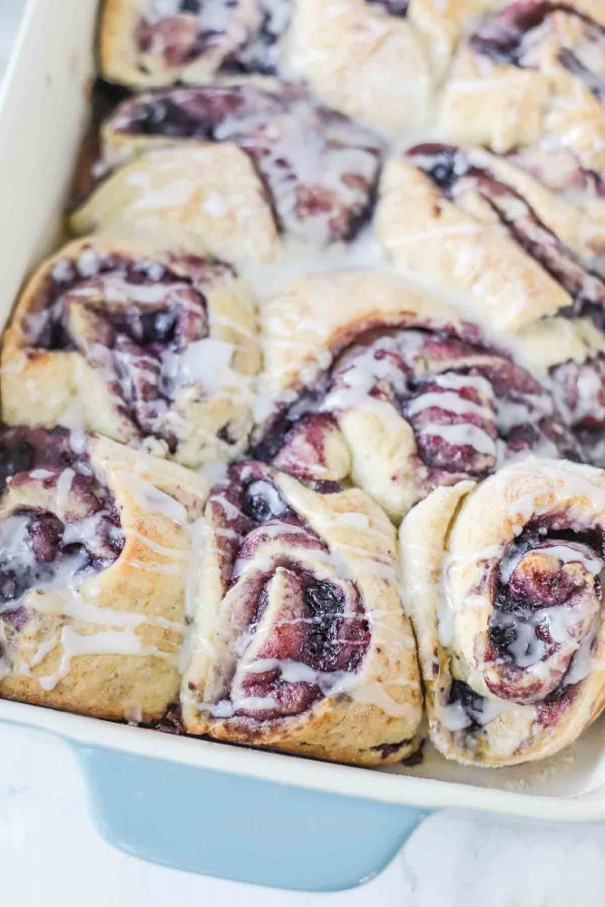 A baking dish of homemade blueberry rolls.
