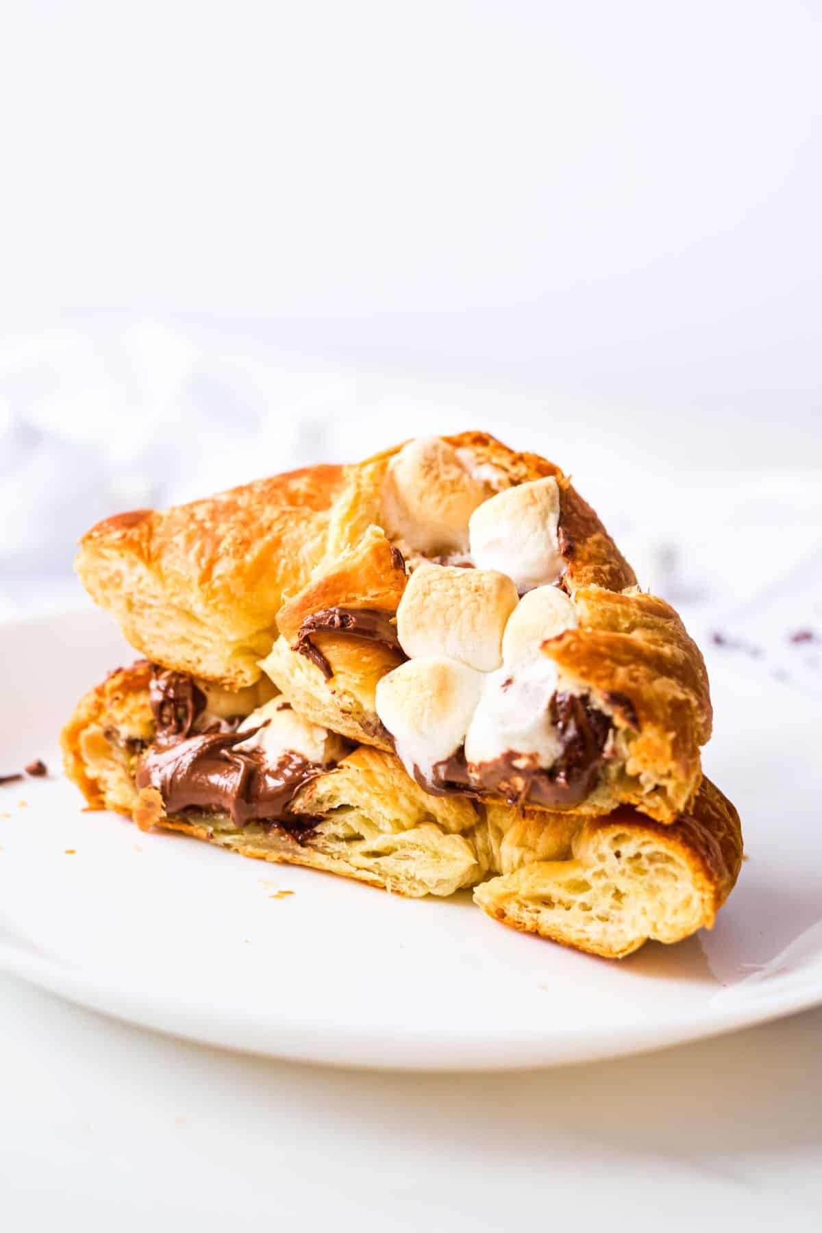 Breakfast croissants stuffed with Nutella and marshmallows.