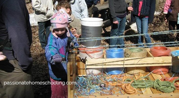 A child making rope at the maple syrup festival.