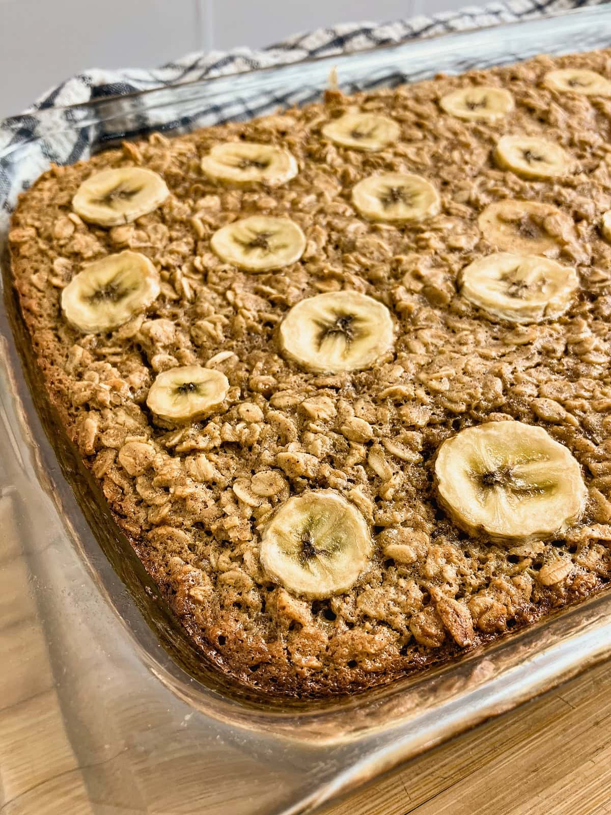 Peanut butter banana baked oatmeal in a baking dish warm from the oven.