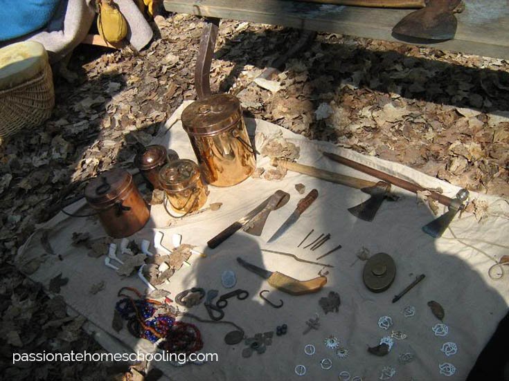 Blanket laid out with items fur traders bartered with.