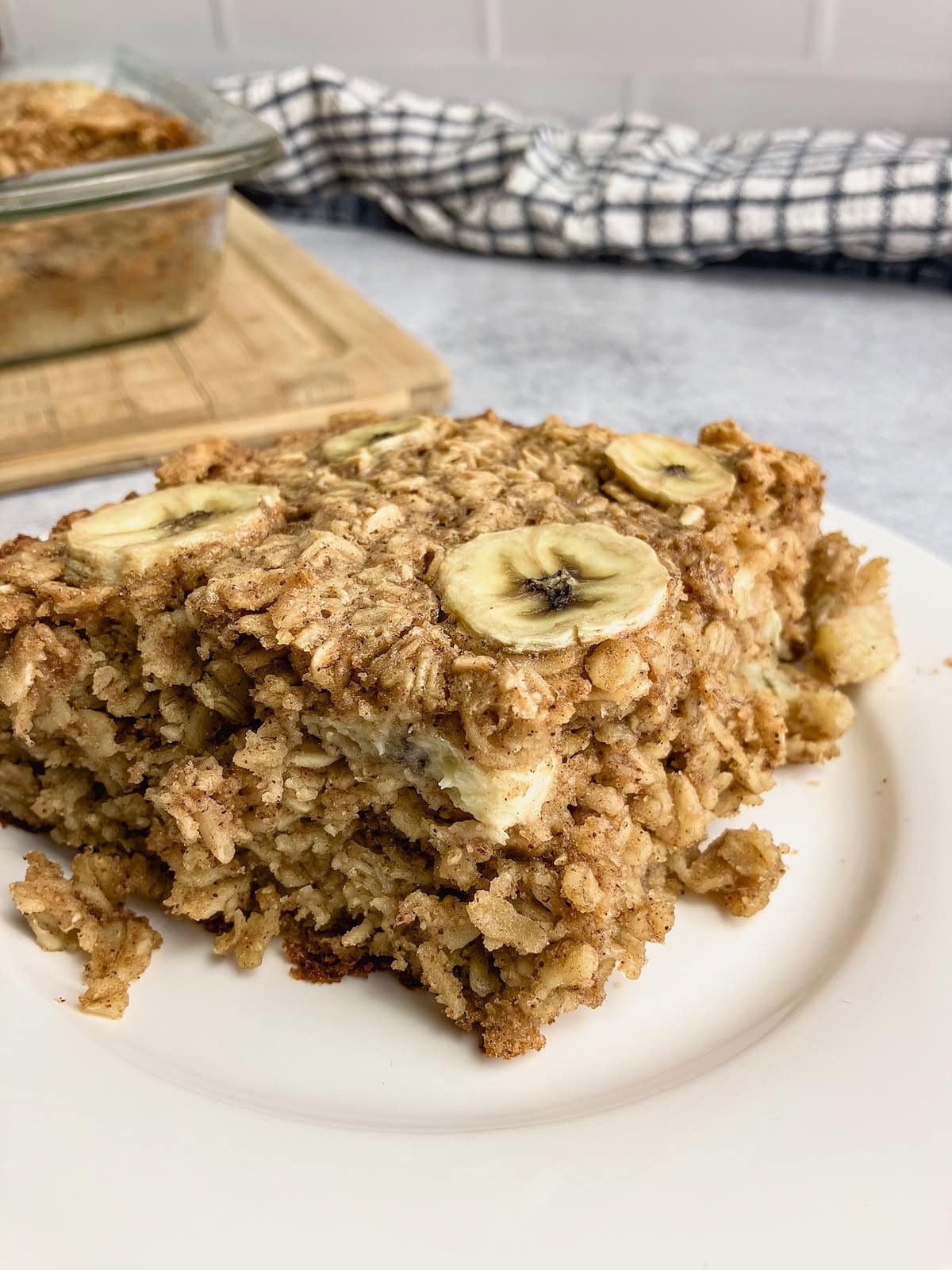 A slice of peanut butter banana baked oatmeal on a plate.