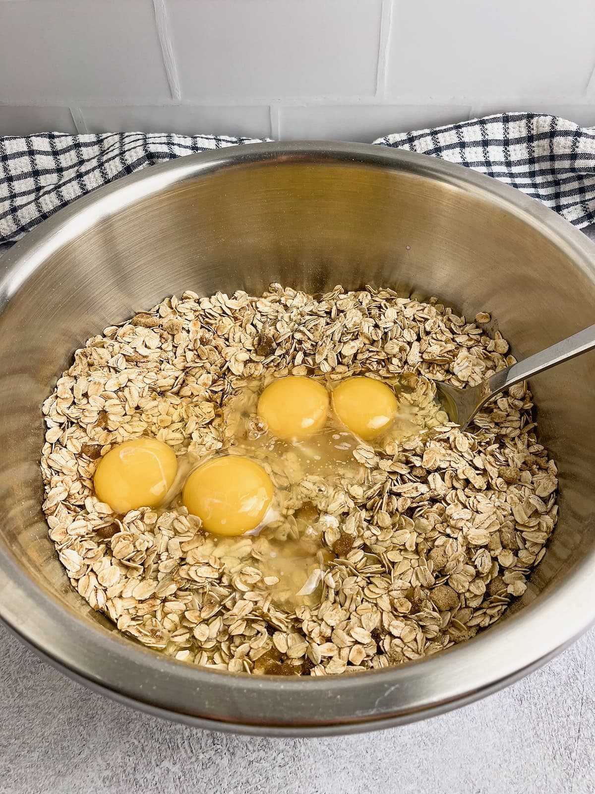 Eggs, milk, melted butter, and vanilla are added to the dry ingredients.