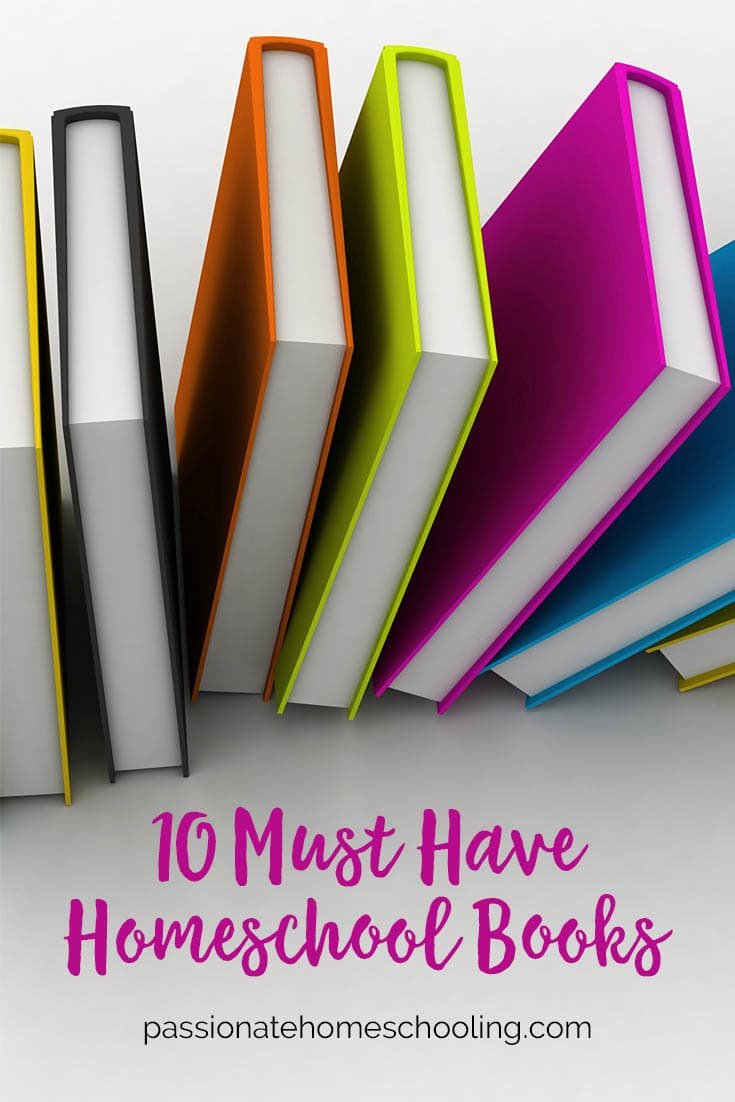 Books with brightly colored covers standing up on a table. Text overlay says 10 Must Have Homeschool Books.