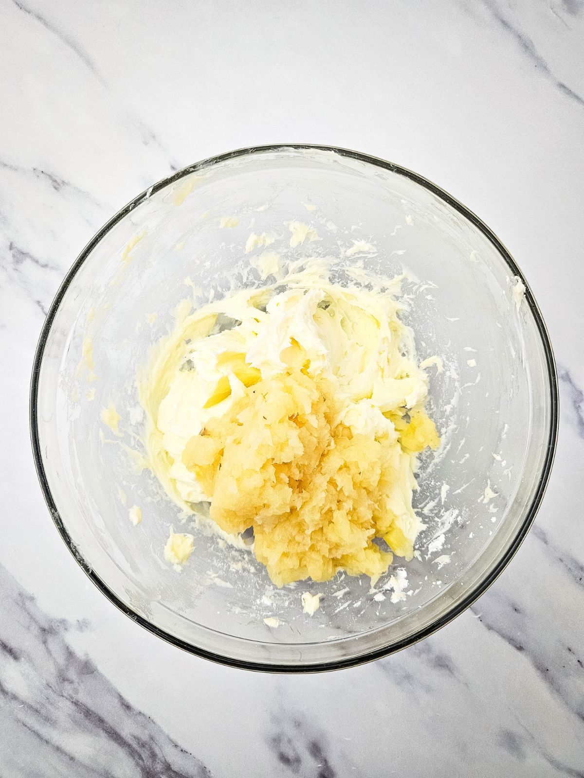 Drained, crushed pineapple added to the filling mixture.