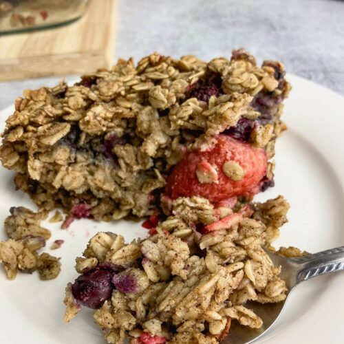 A slice of homemade mixed berry baked oatmeal.