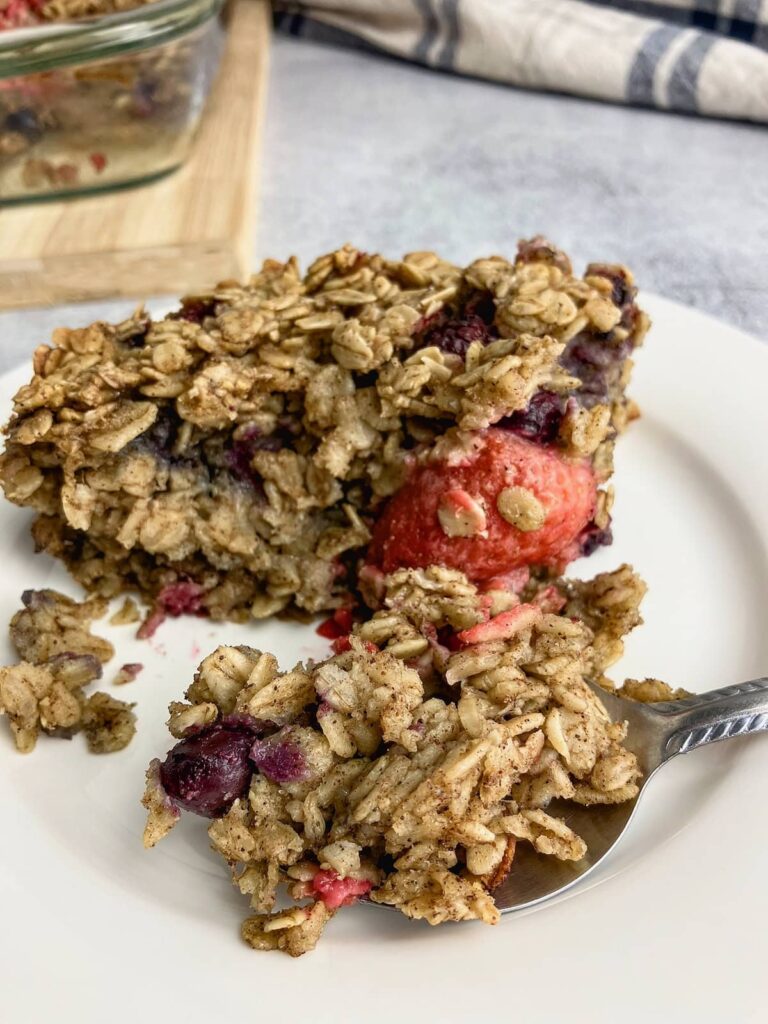 A slice of homemade mixed berry baked oatmeal.