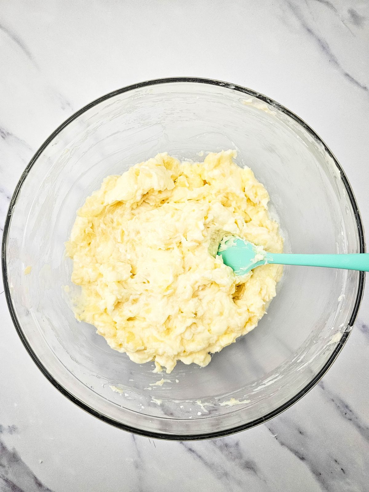 Crushed pineapple mixed into the filling.
