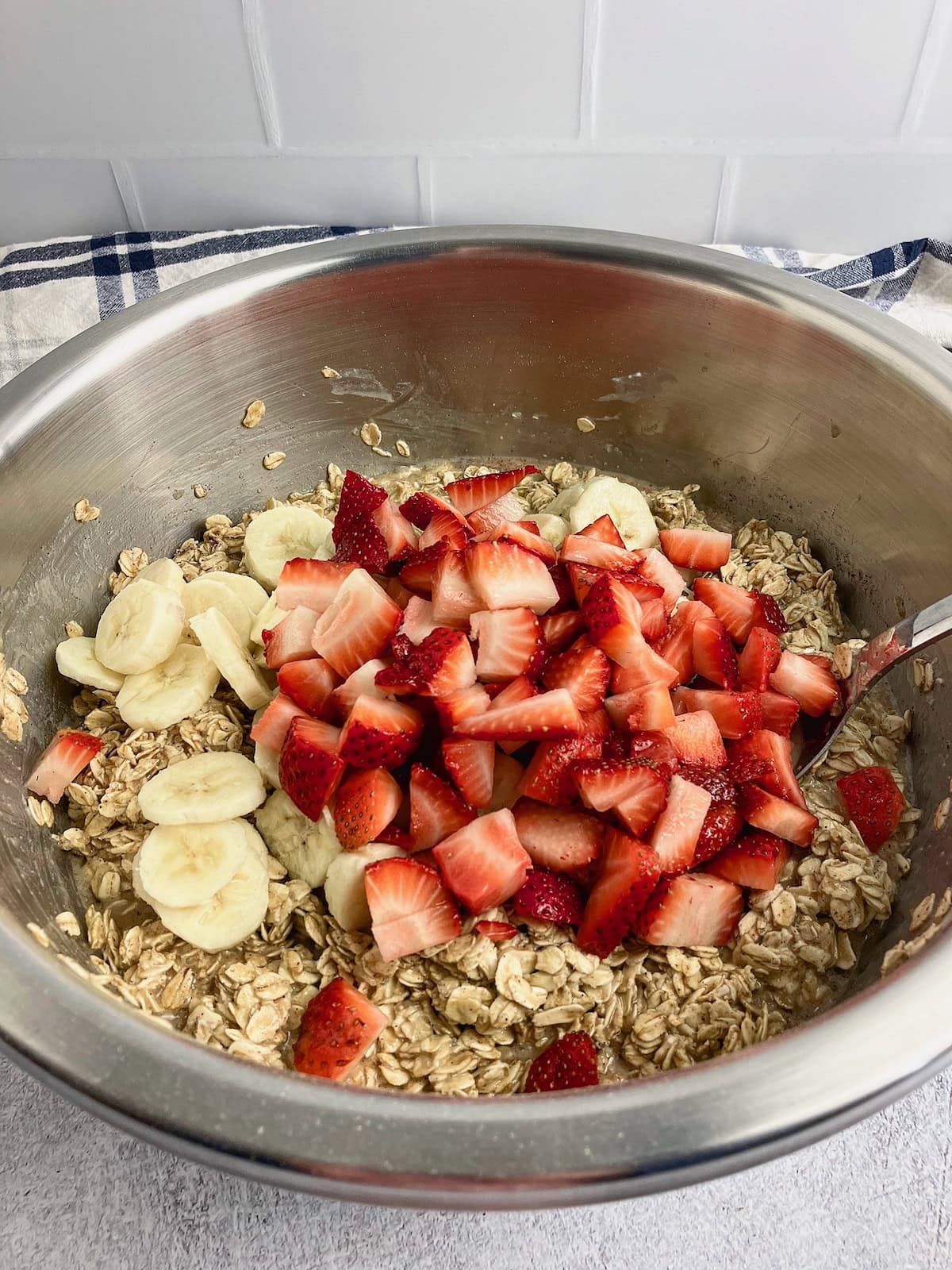 Sliced strawberries and bananas added to the oatmeal batter.