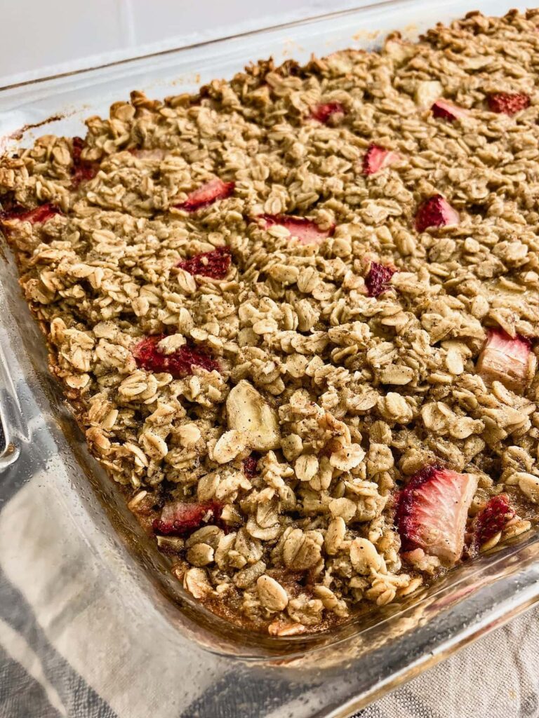 A pan of strawberry banana oatmeal warm from the oven.