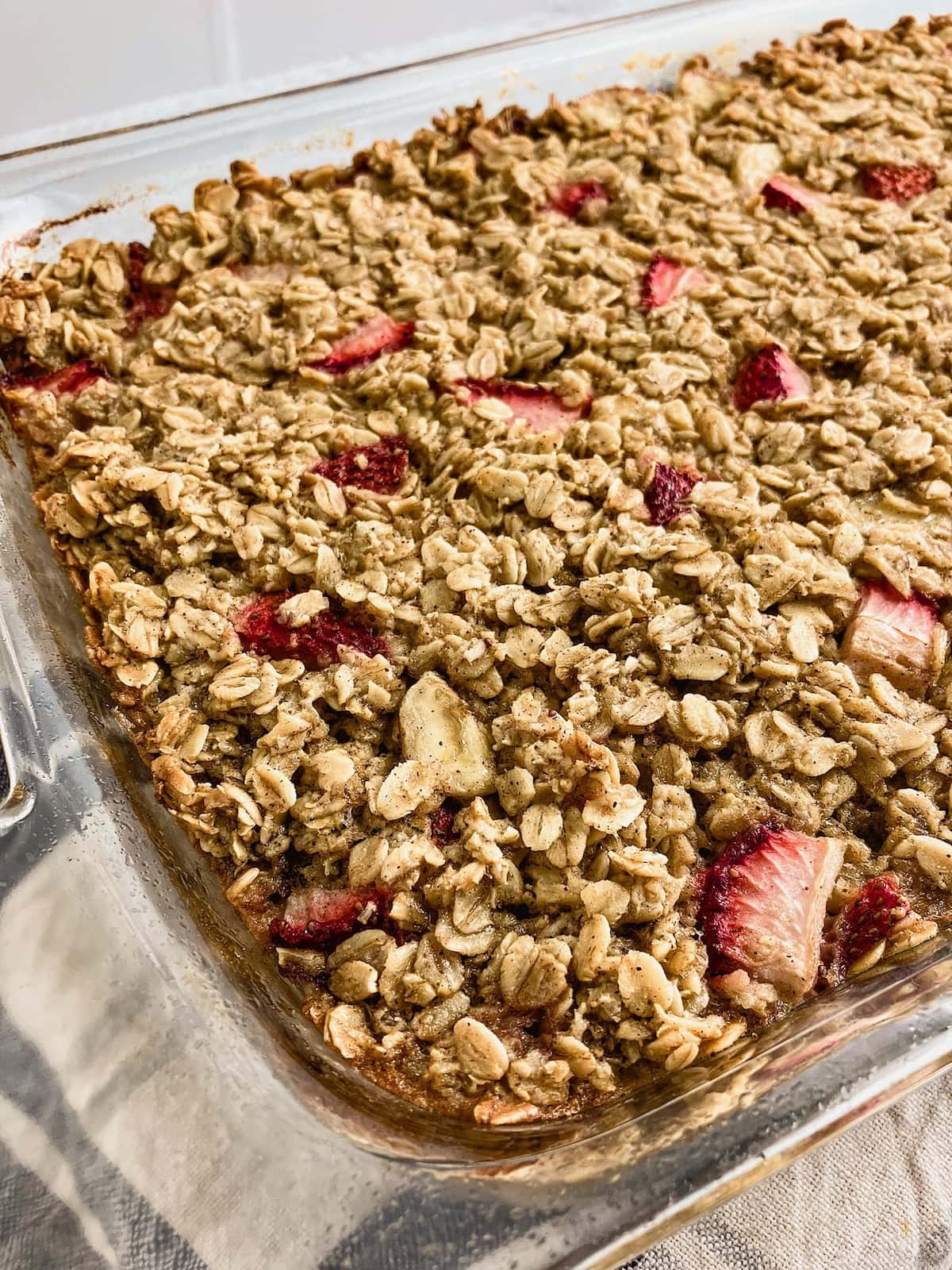 A pan of strawberry banana oatmeal warm from the oven.