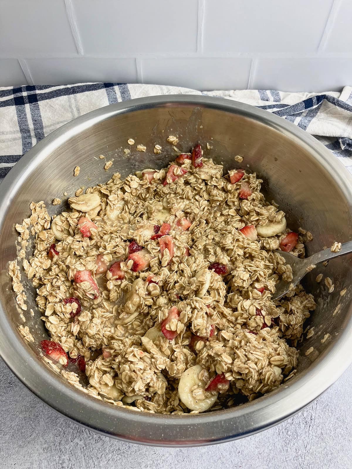 Strawberry and banana baked oatmeal batter mixed together.