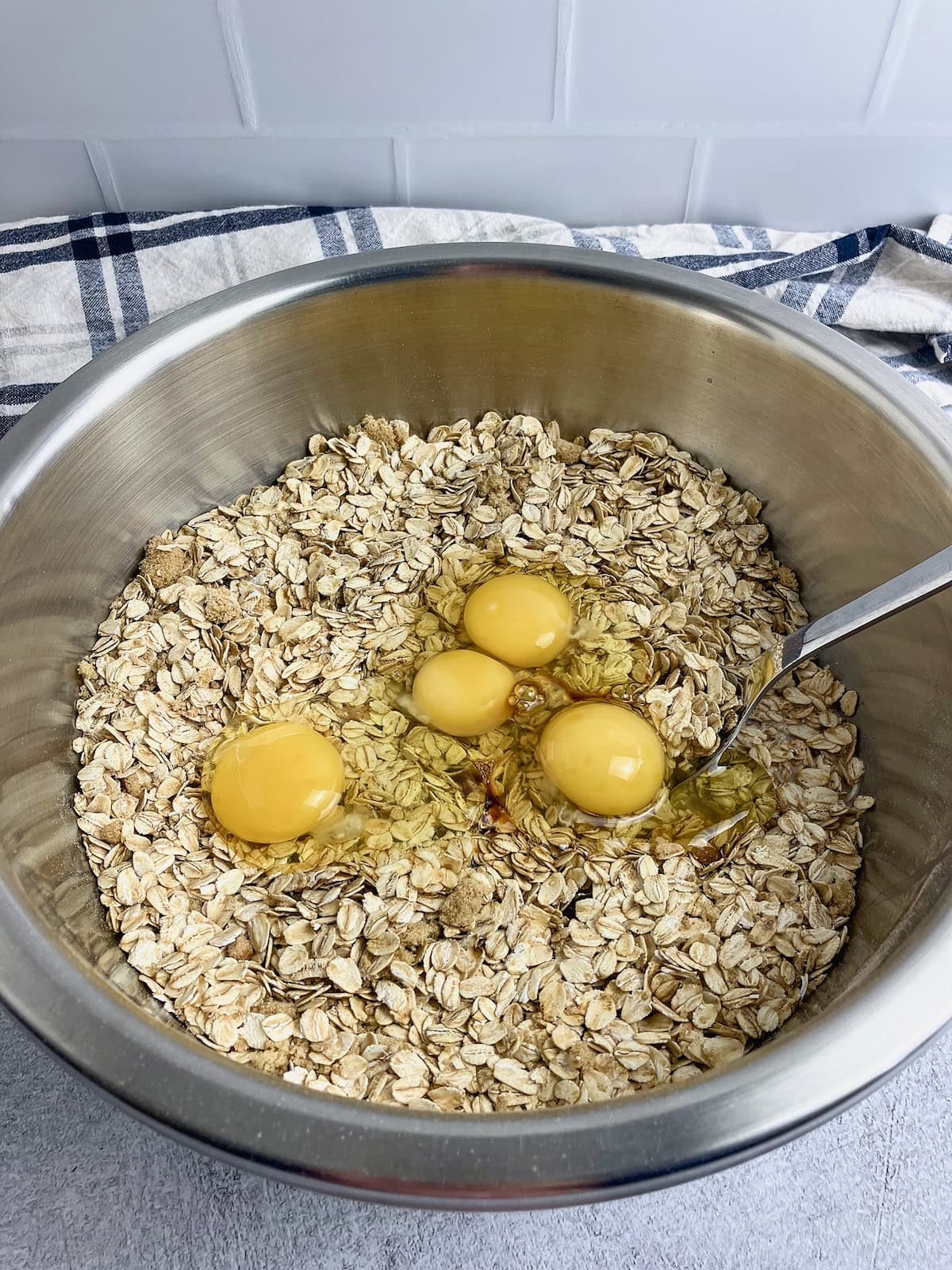 Milk, eggs, melted butter, and vanilla are added to the dry ingredients.