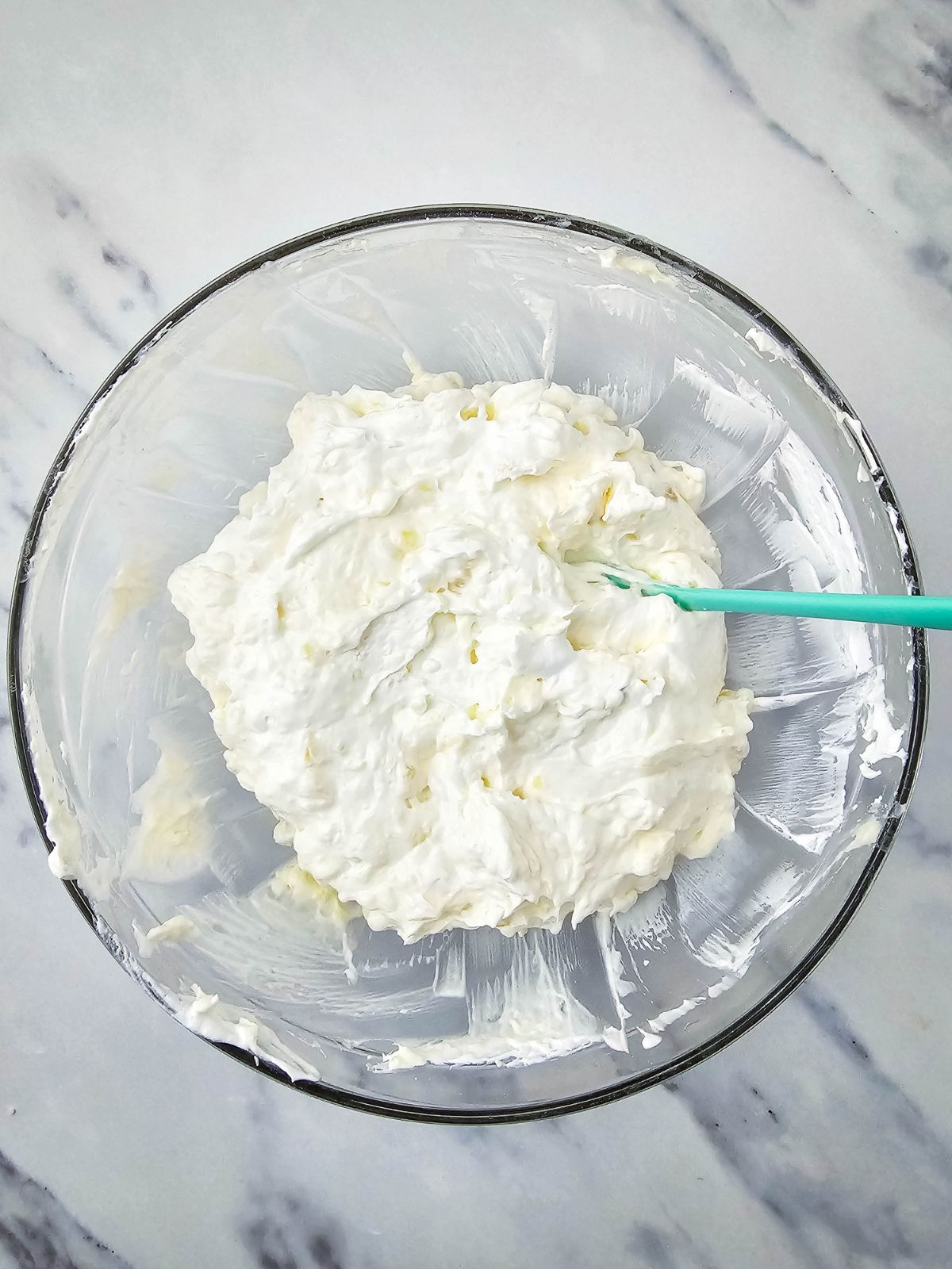 Cool Whip folded into the pineapple filling.