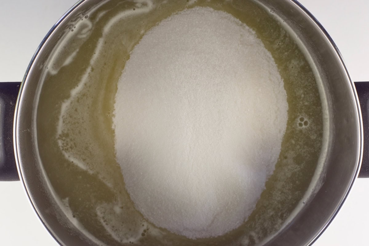 Sugar added to the pot of cucumber juice.
