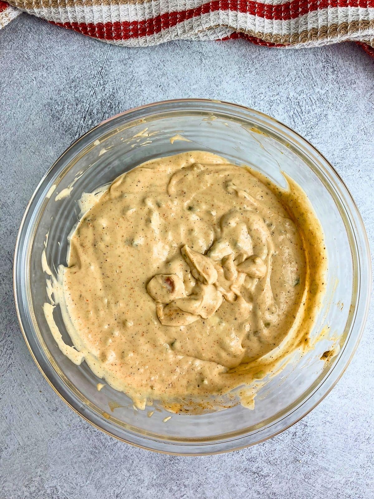 Homemade burger sauce in a glass mixing bowl.