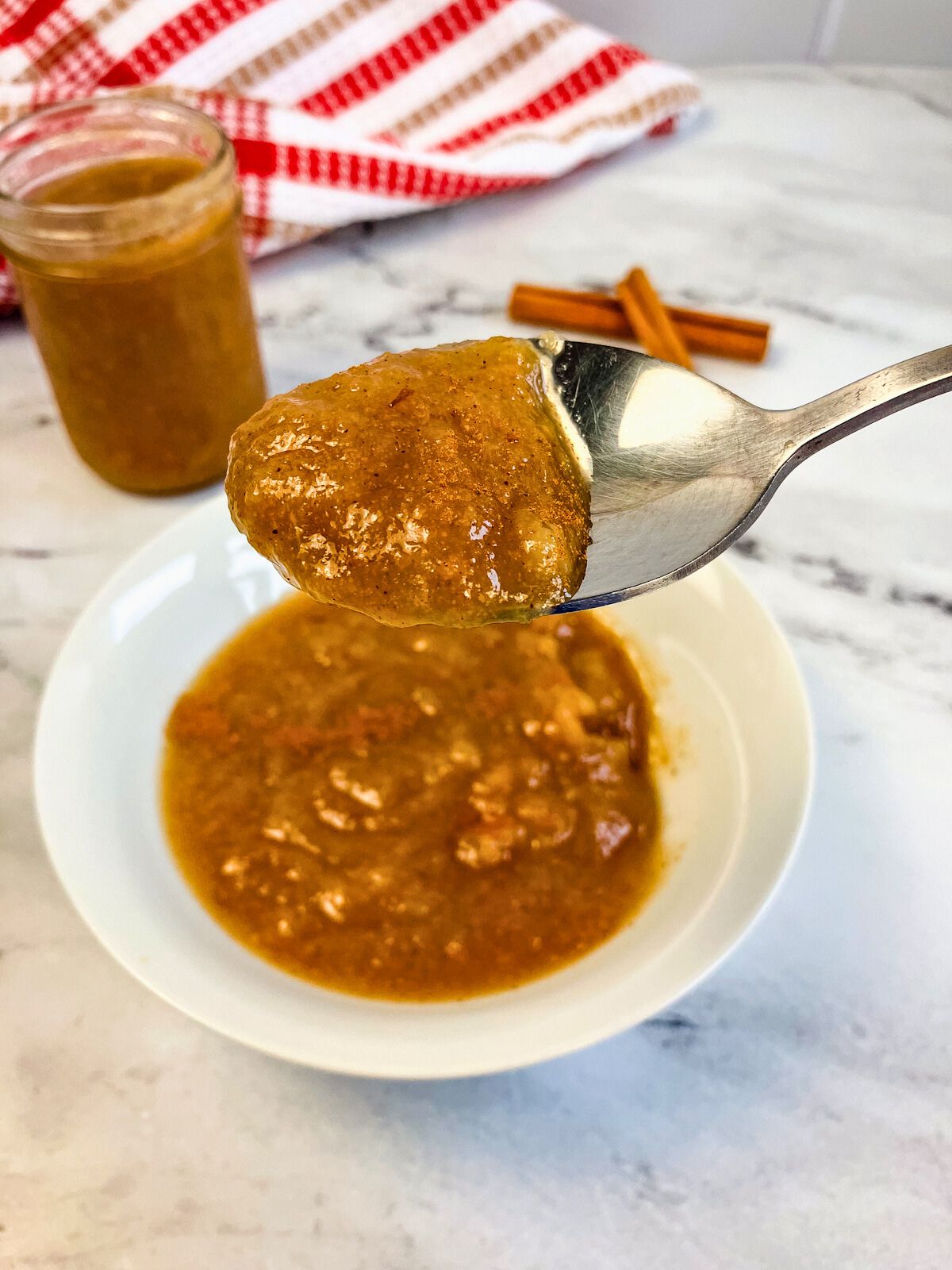 A spoonful of homemade pear sauce.